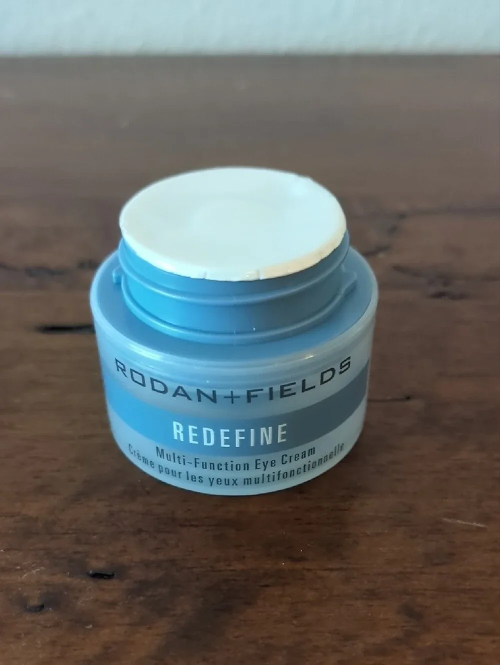 Rodan + Fields REDEFINE Multi-Function Eye Cream in light blue and white
